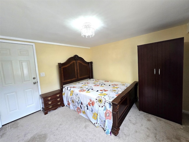 1 Terry Ln, Jericho, NY 11753 - bedroom featuring light colored carpet and a chandelier