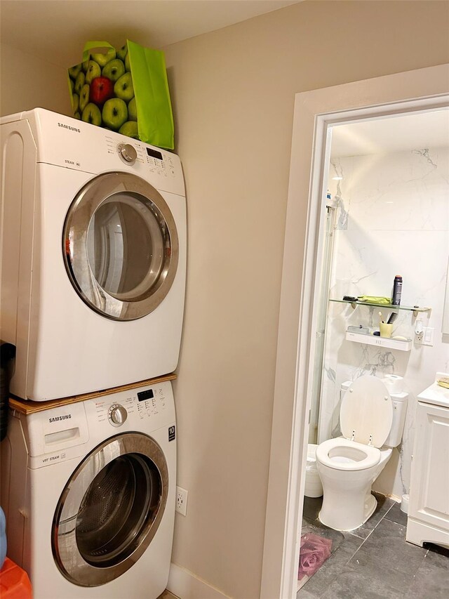 54-23 153rd St, Flushing, NY 11355 - laundry area with stacked washer / dryer