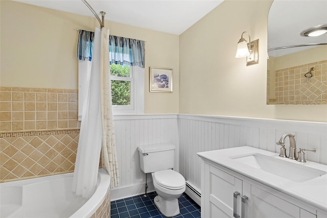 40 Maidstone Ave, East Hampton, NY 11937 - full bathroom with shower / tub combo, a wainscoted wall, vanity, tile patterned floors, and toilet