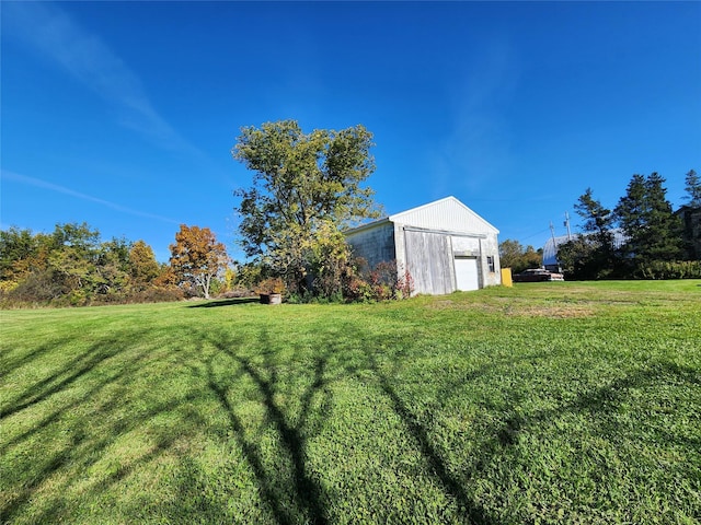 111 Klemme Rd, Root, NY 12166 - view of grassy yard with a garage and an outbuilding