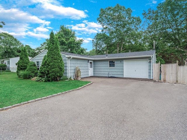 2 Pinetop Dr, Shirley, NY 11967 - view of front of home with an attached garage and asphalt driveway