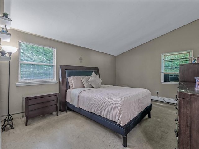 2 Pinetop Dr, Shirley, NY 11967 - bedroom with baseboard heating, lofted ceiling, carpet, and cooling unit