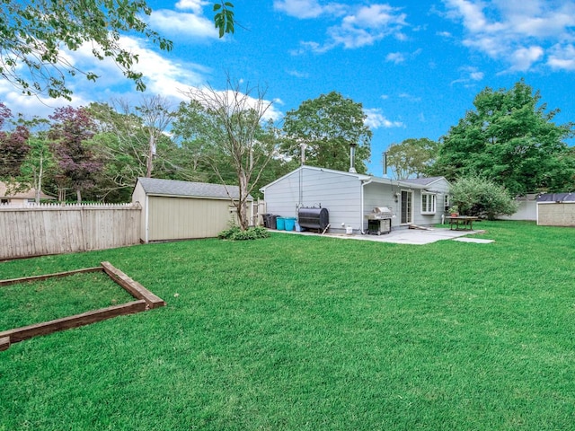 2 Pinetop Dr, Shirley, NY 11967 - fenced backyard with a patio area, oil tank, and a storage unit