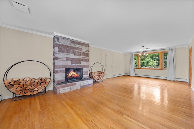 38 Degarmo Hills Rd, Wappingers Falls, NY 12590 - unfurnished living room with a stone fireplace, wood finished floors, crown molding, a chandelier, and baseboards