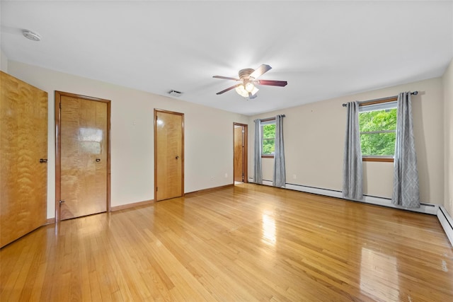 38 Degarmo Hills Rd, Wappingers Falls, NY 12590 - unfurnished bedroom featuring multiple windows, light wood-type flooring, baseboards, and ceiling fan
