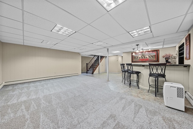 38 Degarmo Hills Rd, Wappingers Falls, NY 12590 - indoor dry bar featuring stairway, carpet flooring, a paneled ceiling, a baseboard radiator, and baseboards