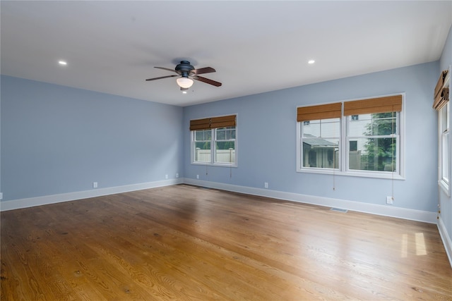 22 Commonwealth Ave, Massapequa, NY 11758 - empty room featuring a ceiling fan, baseboards, wood finished floors, and recessed lighting