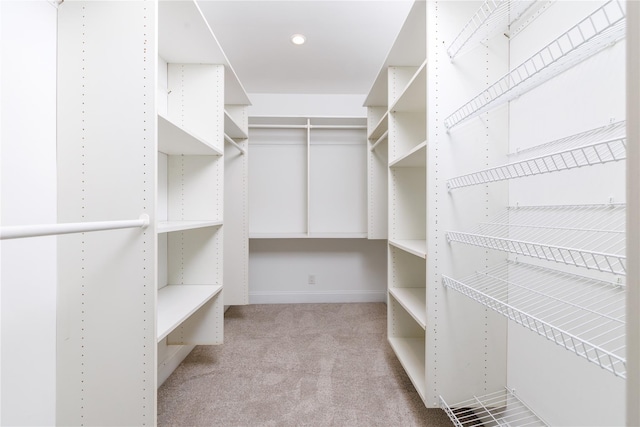 22 Commonwealth Ave, Massapequa, NY 11758 - walk in closet featuring carpet flooring
