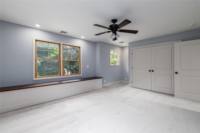 22 Commonwealth Ave, Massapequa, NY 11758 - unfurnished bedroom with light colored carpet, recessed lighting, a closet, and ceiling fan