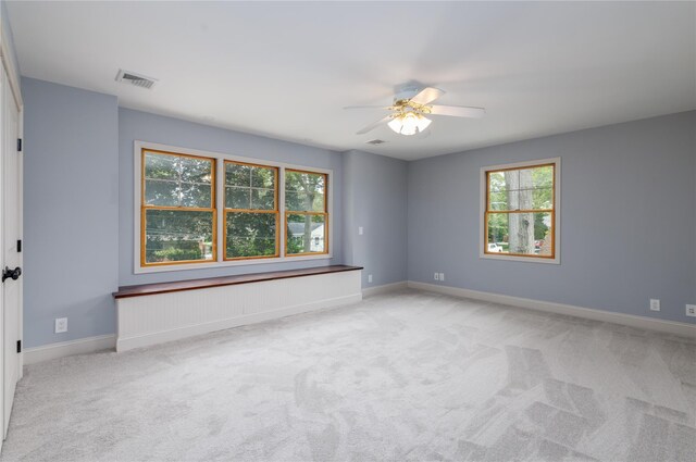 22 Commonwealth Ave, Massapequa, NY 11758 - unfurnished room with a ceiling fan, light carpet, and baseboards