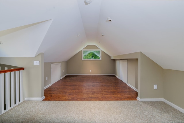 22 Commonwealth Ave, Massapequa, NY 11758 - bonus room featuring carpet flooring, lofted ceiling, and baseboards