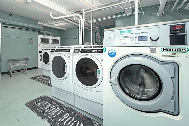 151 Centre Ave Unit 5D, New Rochelle, NY 10805 - communal laundry room with washing machine and clothes dryer and tile patterned floors