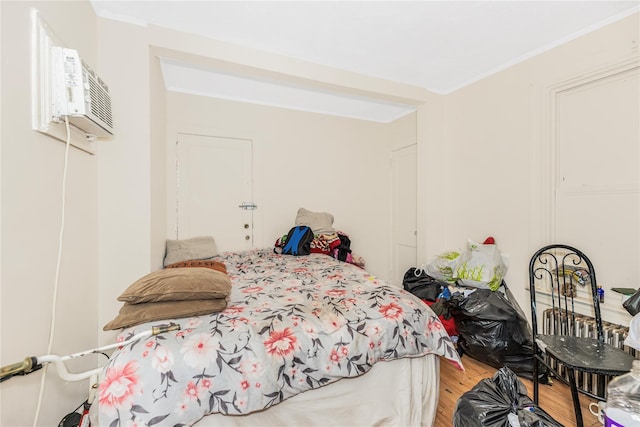 132 Oak St, Yonkers, NY 10701 - bedroom featuring light wood finished floors and a wall mounted AC