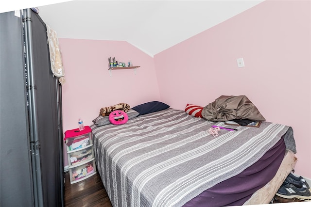 132 Oak St, Yonkers, NY 10701 - bedroom featuring vaulted ceiling and wood finished floors