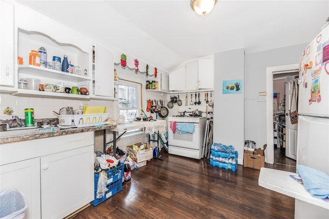 132 Oak St, Yonkers, NY 10701 - kitchen with white appliances, lofted ceiling, open shelves, decorative backsplash, and white cabinetry