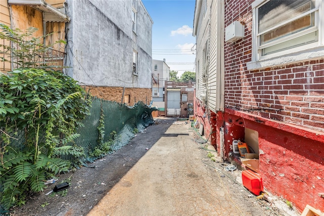 132 Oak St, Yonkers, NY 10701 - view of side of home featuring brick siding
