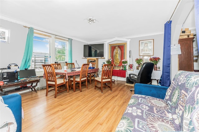 132 Oak St, Yonkers, NY 10701 - dining area with ornamental molding and light wood finished floors