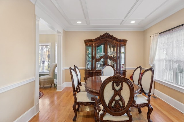 140 Grant Dr, Aquebogue, NY 11931 - dining room with light wood finished floors, ornate columns, recessed lighting, baseboards, and crown molding