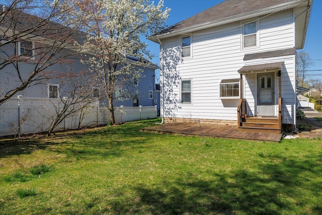 81 Liberty Ave, Rockville Centre, NY 11570 - rear view of house with entry steps, a wooden deck, and a shingled roof