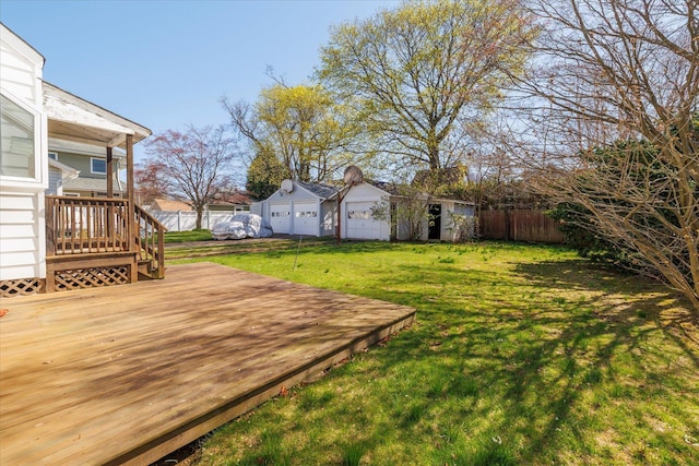 81 Liberty Ave, Rockville Centre, NY 11570 - view of yard featuring a wooden deck and an outbuilding