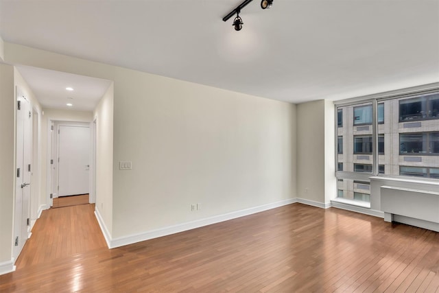 120 Riverside Blvd Unit 10T, New York Manhattan, NY 10069 - unfurnished room featuring hardwood / wood-style flooring, baseboards, and recessed lighting