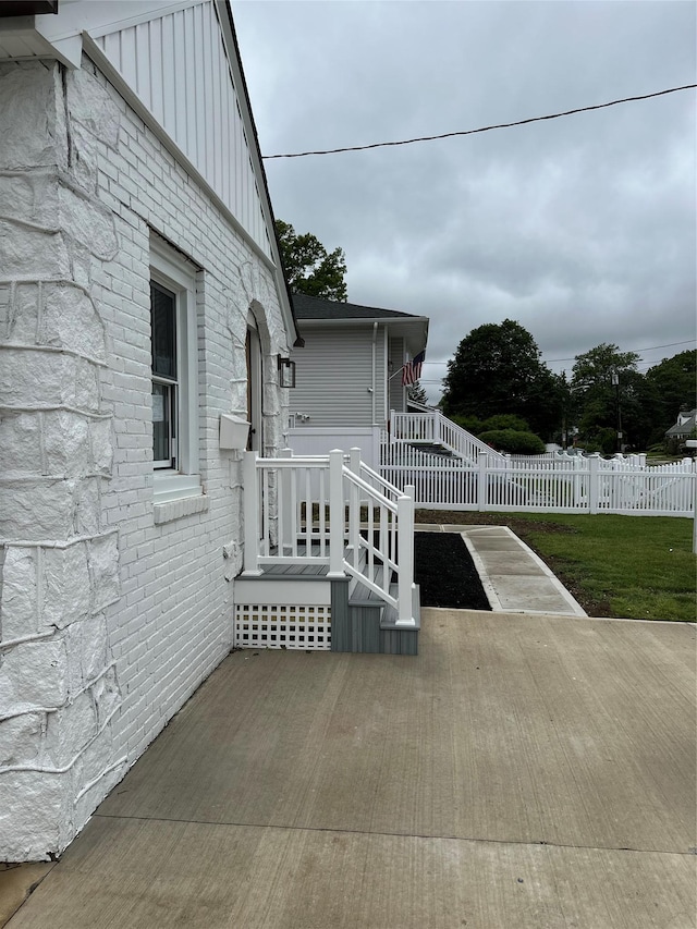 84 Windsor, Hempstead, NY 11550 - wooden terrace featuring a patio area