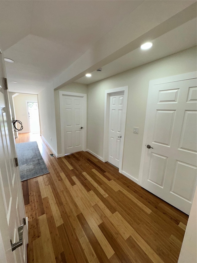 84 Windsor, Hempstead, NY 11550 - hall with wood finished floors, baseboards, and recessed lighting