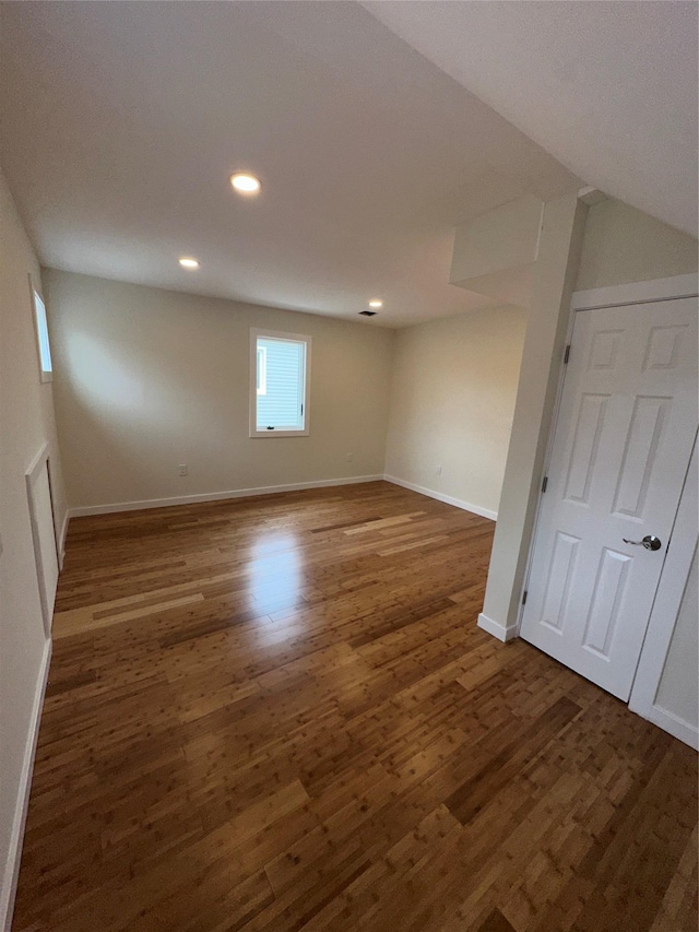 84 Windsor, Hempstead, NY 11550 - spare room with wood finished floors, baseboards, and recessed lighting