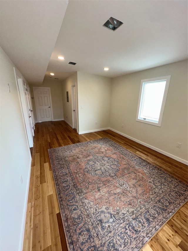 84 Windsor, Hempstead, NY 11550 - unfurnished room with light wood-type flooring, baseboards, and recessed lighting