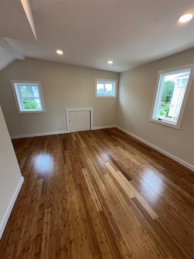 84 Windsor, Hempstead, NY 11550 - spare room featuring dark wood finished floors, healthy amount of natural light, baseboards, and recessed lighting