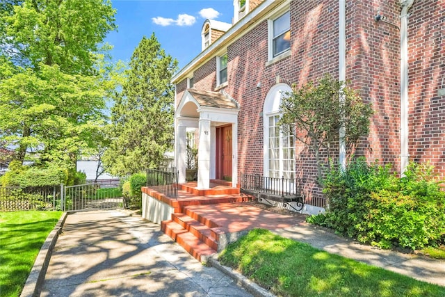 95 Malba Dr Unit 1, Malba, NY 11357 - view of exterior entry featuring brick siding