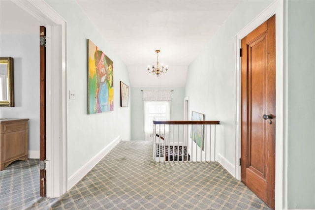 95 Malba Dr Unit 1, Malba, NY 11357 - hall featuring carpet flooring, a chandelier, an upstairs landing, and baseboards
