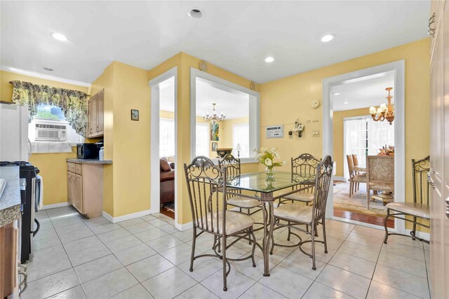 95 Malba Dr Unit 1, Malba, NY 11357 - dining area featuring a chandelier, light tile patterned floors, recessed lighting, and baseboards