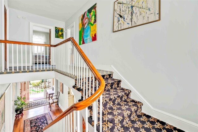 95 Malba Dr Unit 1, Malba, NY 11357 - staircase with wood finished floors