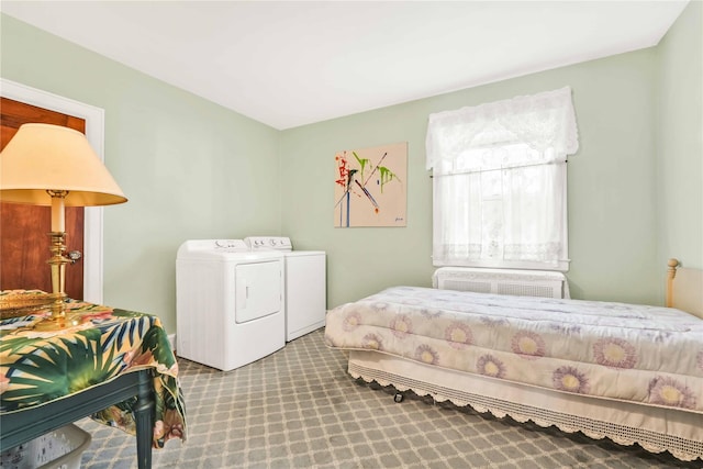 95 Malba Dr Unit 1, Malba, NY 11357 - bedroom with washing machine and dryer, a wall mounted air conditioner, and carpet flooring