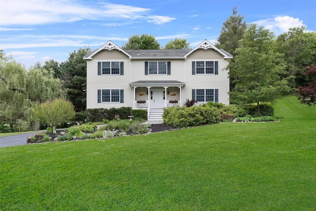 1 Bray Farm Ln, Wappingers Falls, NY 12590 - view of front of home with a front lawn and a porch