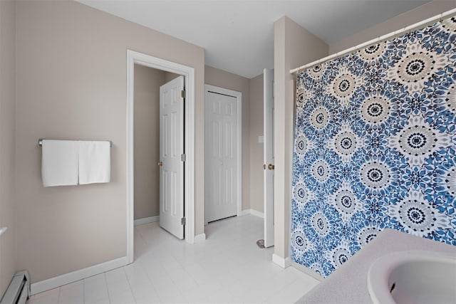1 Bray Farm Ln, Wappingers Falls, NY 12590 - bathroom featuring a baseboard heating unit, baseboards, curtained shower, and tile patterned floors