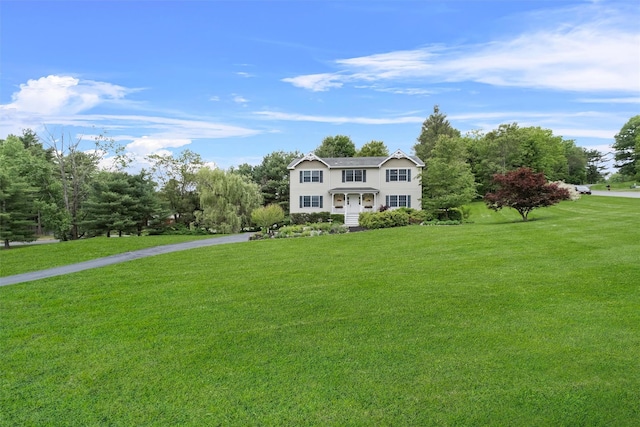 1 Bray Farm Ln, Wappingers Falls, NY 12590 - colonial-style house featuring a front lawn and driveway