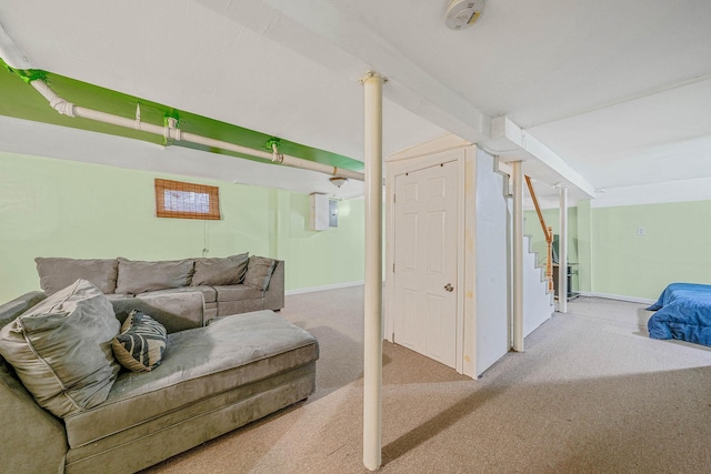 1668 Atherton Ave, Elmont, NY 11003 - carpeted living area with baseboards