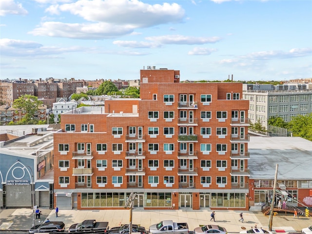 91-23 Corona Ave Unit 2F, Elmhurst, NY 11373 - view of building exterior featuring a city view