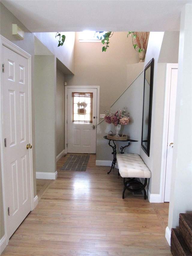 44 Vanderburgh Rd, Poughquag, NY 12570 - foyer entrance with stairs, light wood-style floors, and baseboards