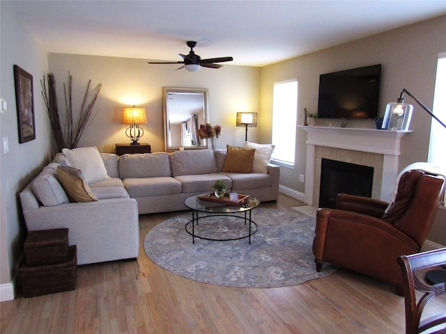 44 Vanderburgh Rd, Poughquag, NY 12570 - living room featuring wood finished floors, a fireplace with flush hearth, a ceiling fan, and baseboards