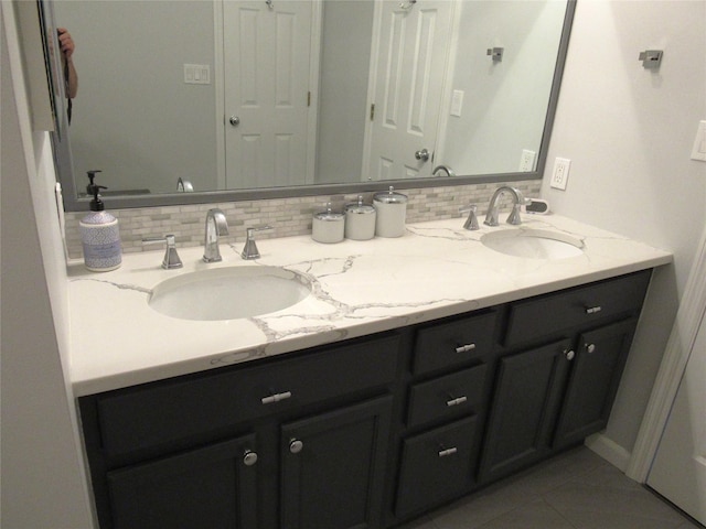 44 Vanderburgh Rd, Poughquag, NY 12570 - bathroom with double vanity, tile patterned floors, and decorative backsplash