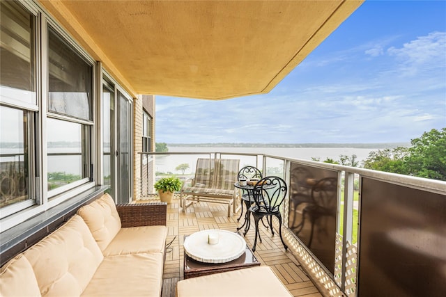 17-85 215th St Unit 4M, Bayside, NY 11360 - balcony featuring a water view and outdoor lounge area