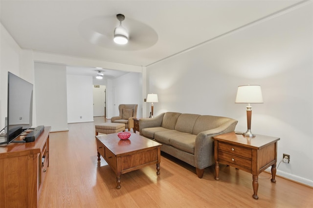 70 Sherman Ave Unit 2G, Yonkers, NY 10705 - living room featuring a ceiling fan, light wood-style floors, and baseboards