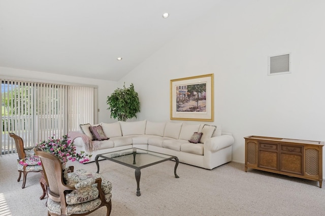 15 Augusta Ln, Manhasset, NY 11030 - living area with vaulted ceiling, recessed lighting, and light carpet