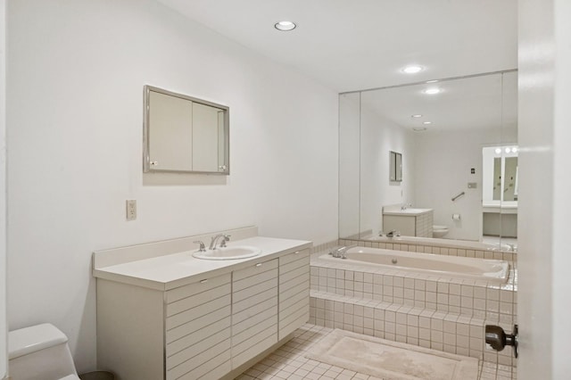 15 Augusta Ln, Manhasset, NY 11030 - full bathroom featuring a garden tub, vanity, tile patterned floors, and recessed lighting