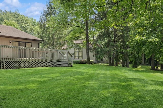 15 Augusta Ln, Manhasset, NY 11030 - view of grassy yard featuring a deck