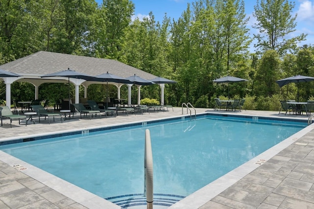 15 Augusta Ln, Manhasset, NY 11030 - community pool with outdoor dining area, a patio area, and a gazebo