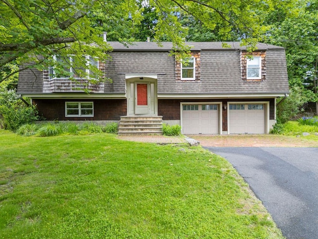 10 Karow Ct, Monsey, NY 10952 - view of front of home featuring a garage, driveway, a front yard, and a shingled roof